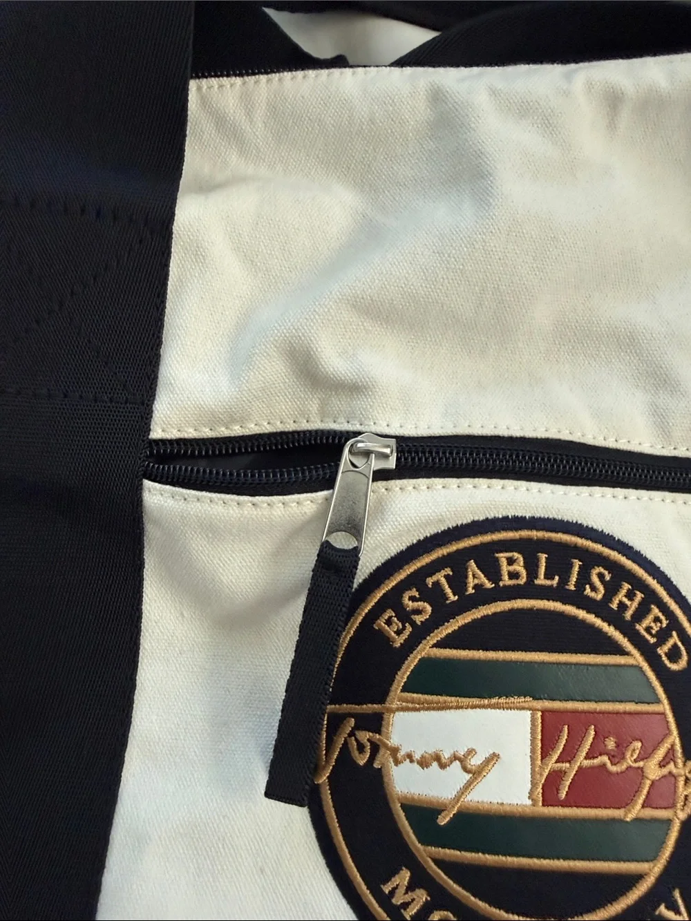 Tommy Hilfiger White Canvas Duffel with Black Straps and Signature Patch